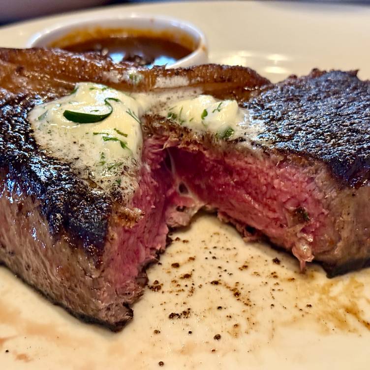 Buffalo Block Prime Steakhouse signature dishes Dry-Aged Ribeye, American Wagyu Tomahawk, Prime Filet Mignon, Seafood Tower